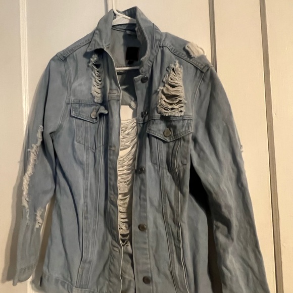 Distressed Jean jacket. - Picture 2 of 3